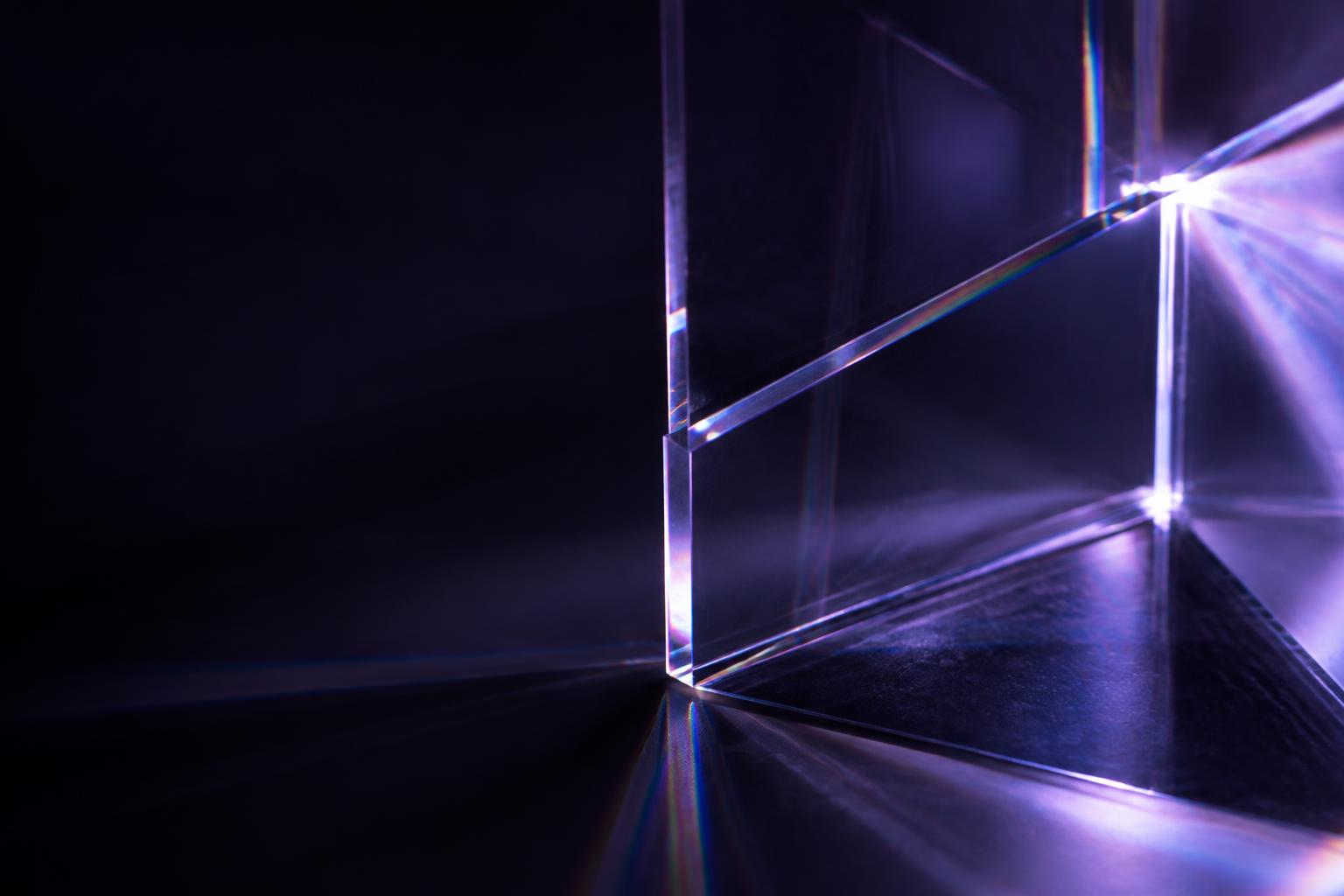 Violet light revealing the edges of intersecting optical glass